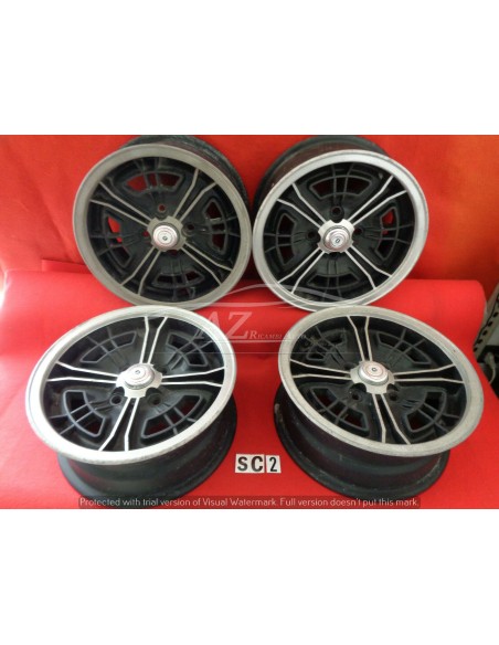 cerchi ruota in lega melber 13"x 5 1/2j bmw set 4-pezzi -  Az Ricambi  Sei alla ricerca di ricambi per la tua auto d’epoca?